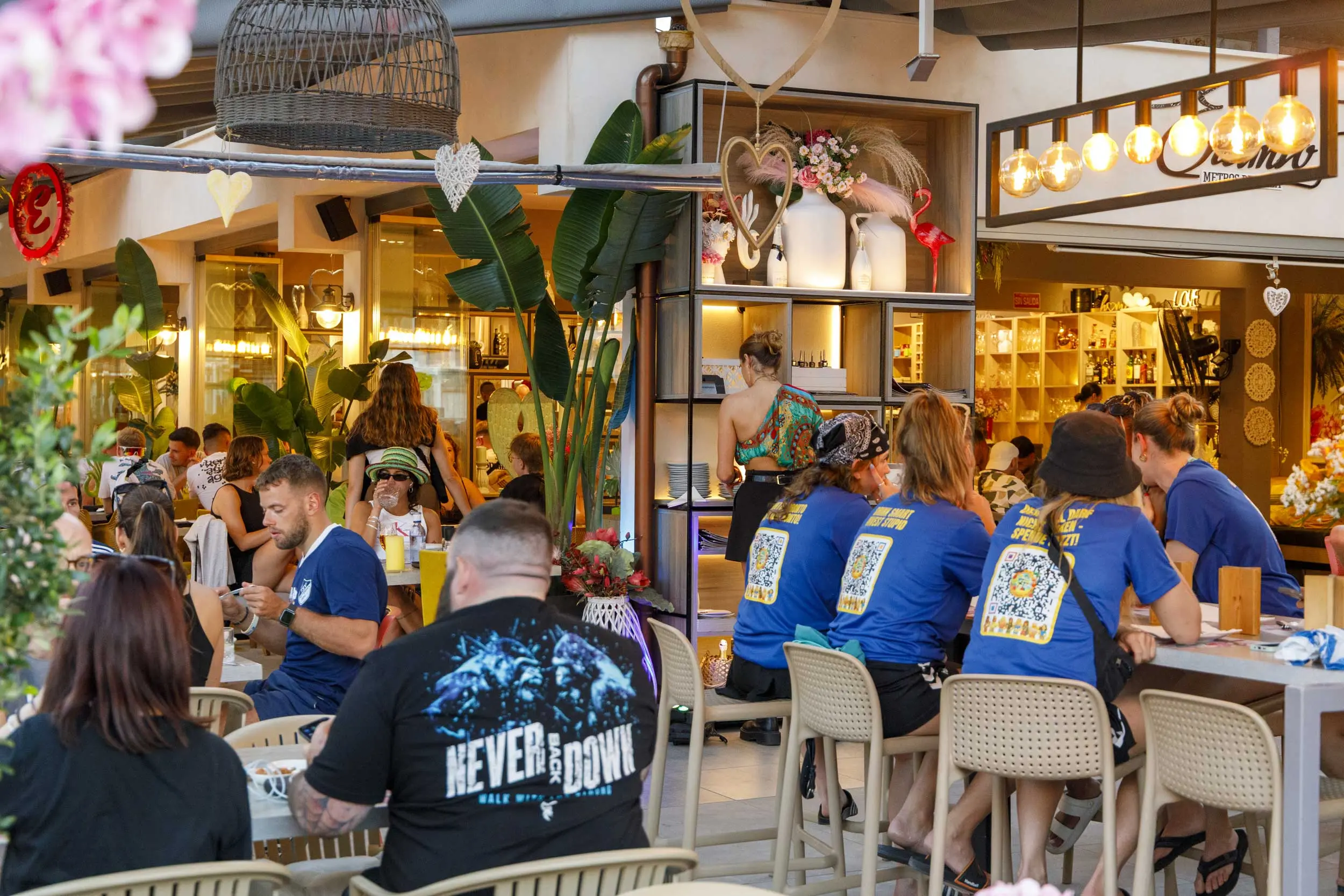 Guests seated in the ENCANTO restaurant