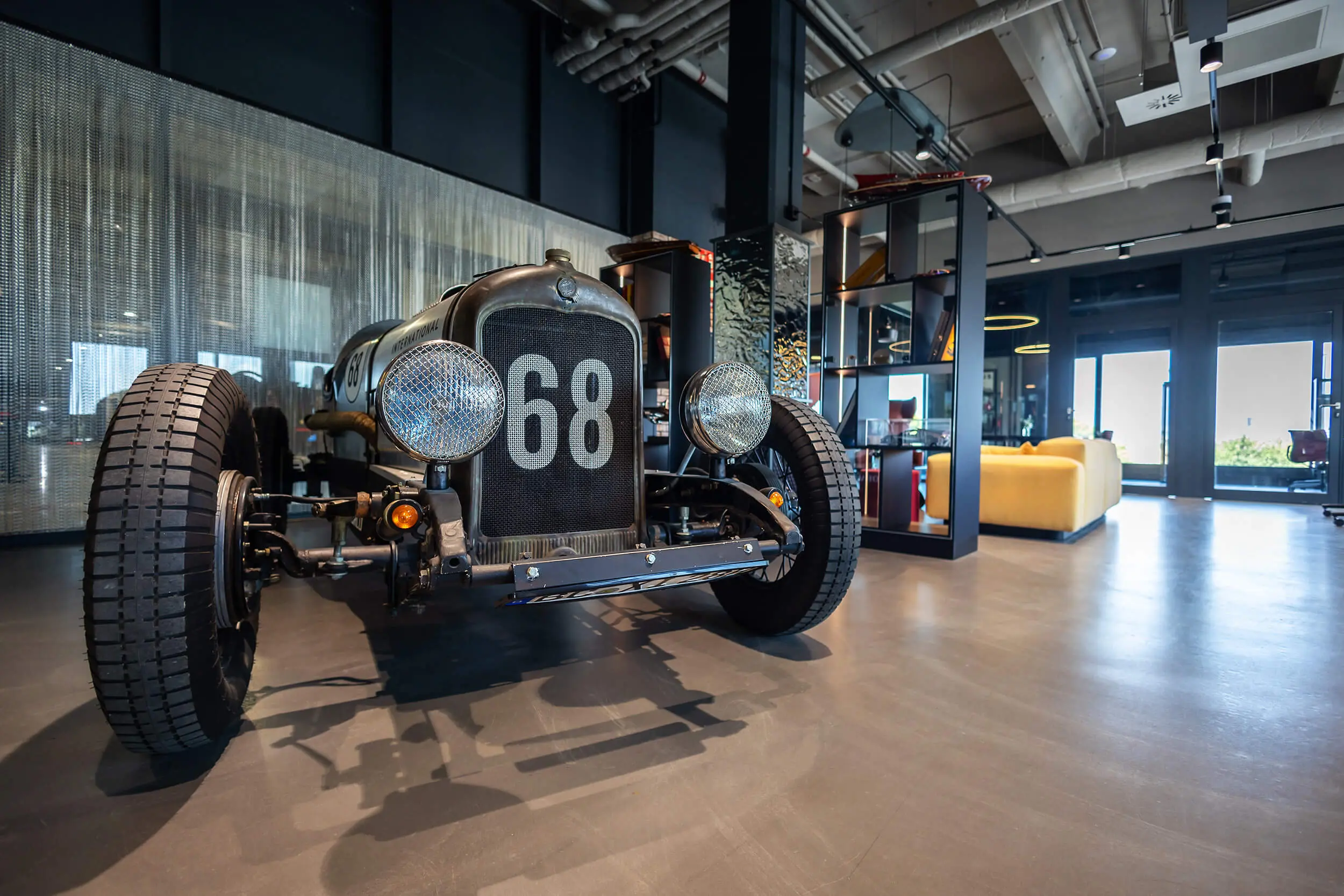 Vintage racing car in the Motorworld showroom